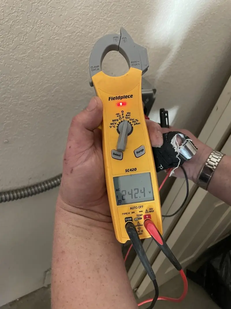 Voltage testing with clamp meter during Hot Tub / Pool Electrical Wiring in Watertown